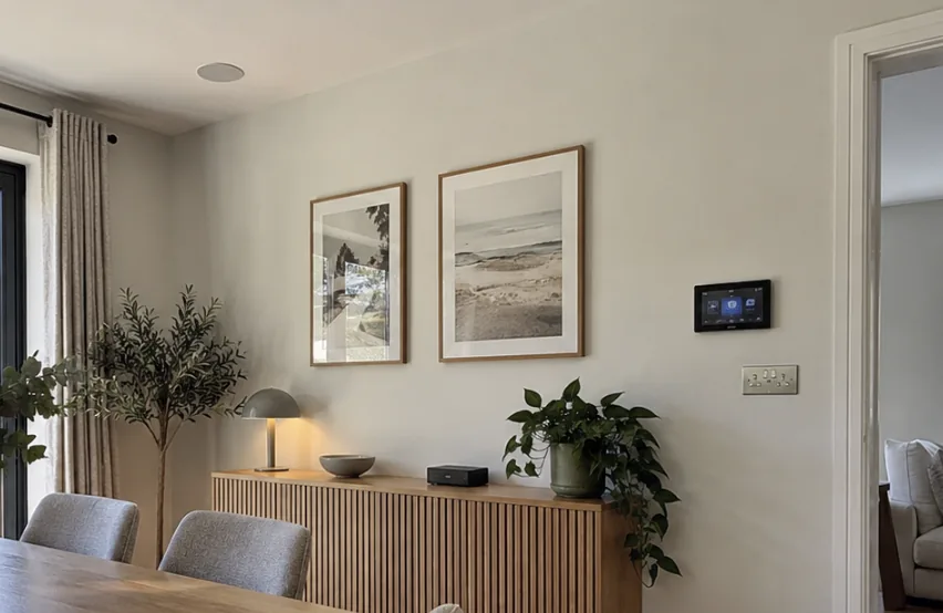 Living room in Kent with a smart wall panel